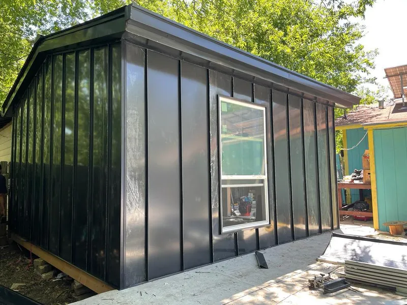 Black standing seam metal wall panels for Metal Roof Installation in Helena Valley West Central