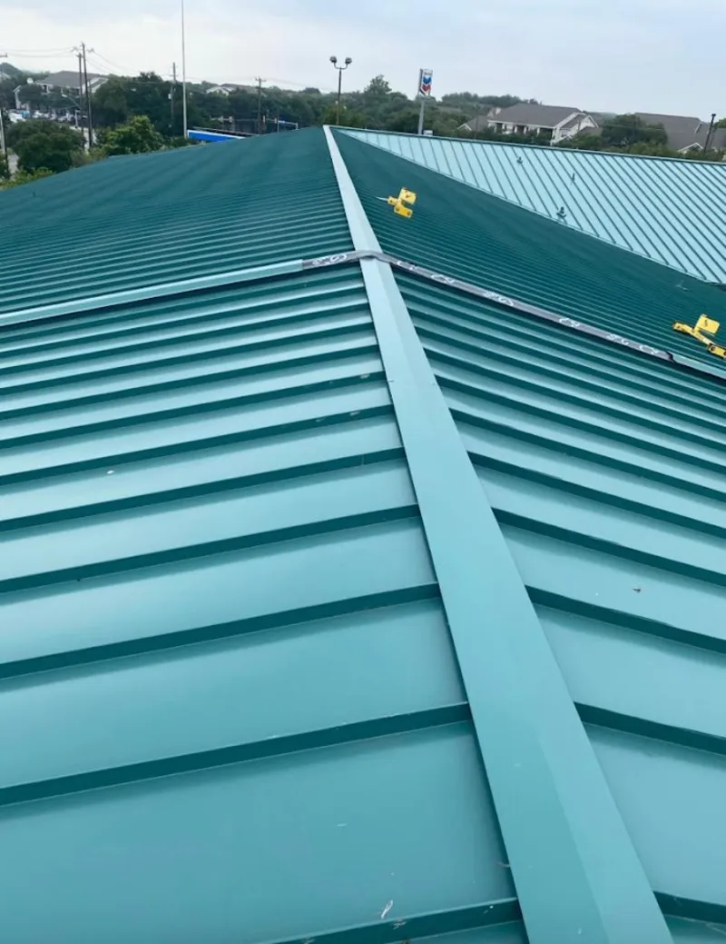 Green commercial metal roof ridge and valley for Metal Roof Repair in Helena Valley West Central